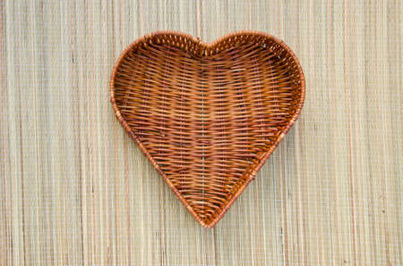 empty heart form wicker basket. Craft objectの写真素材