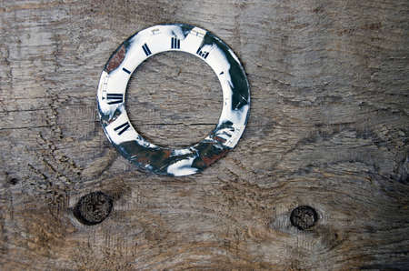 old wooden plank  with retro clock dial backgroundの写真素材