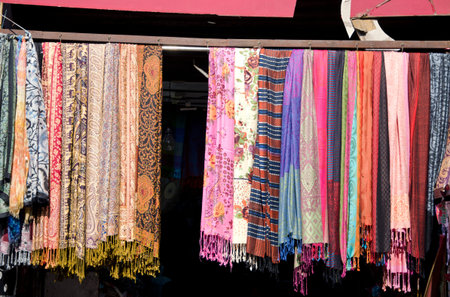 colorful asian shawl in street market, Indiaの写真素材