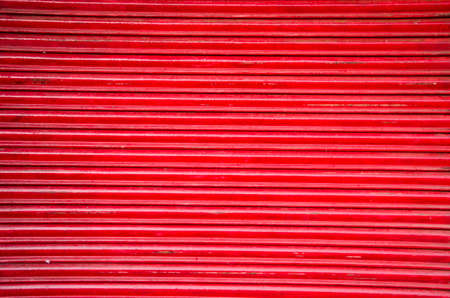 red market metal corrugated door abstract background and textureの写真素材