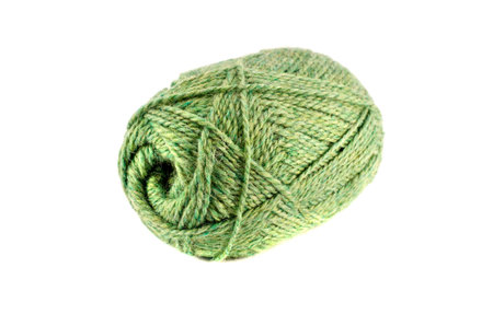 Green wool  thread ball isolated on white backgroundの写真素材