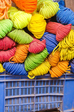 colorful nylon string rope in plastic basket - asia street marketの写真素材