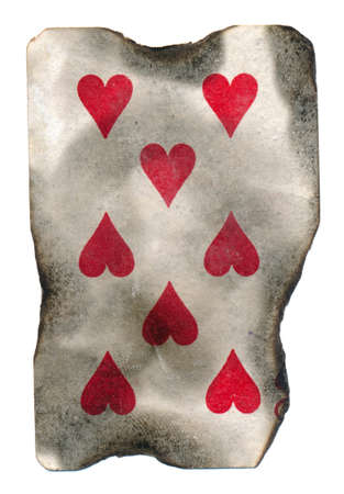 old burnt playing card of hearts paper isolated on whiteの写真素材