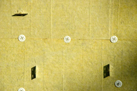 house exterior wall with thermal mineral rock wool insulation materialの写真素材