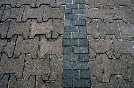 old concrete bricks pavement background and texture