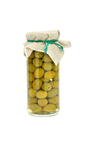 homemade preserved canned olives glass jar isolated on whiteの写真素材