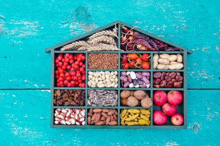 vegetarian healthy fruits, seeds and dried food ingredient collection in wooden boxの写真素材