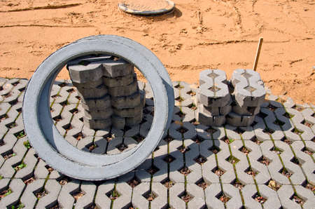 Pavement blocks getting layed on sand in city streetの写真素材