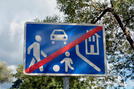 road sign with symbols ir park street