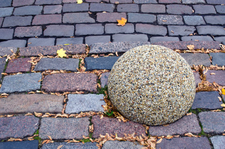 old town street road brick background and granite ballの写真素材