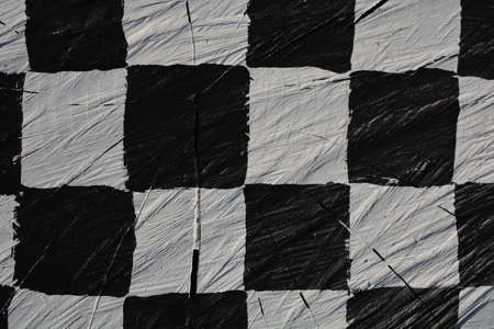 cracked wooden chess style background and textureの写真素材