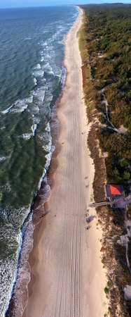 Aerial view over a Baltic Sea shore beach near Nida, Lithuania, vertical panoの写真素材