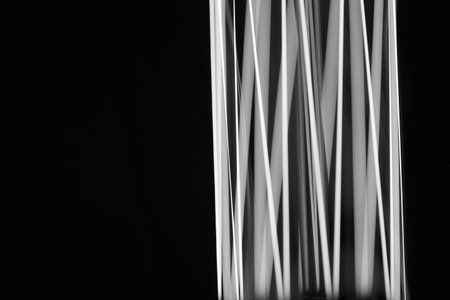 A black and white of the lines made by a shaped light bulb.の写真素材
