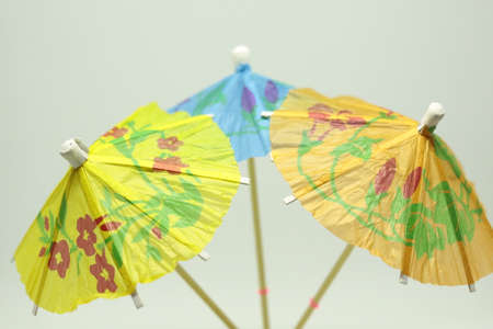 Three cocktail umbrellas.  A studio shot.の写真素材