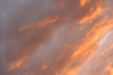 Cloudscape, Colored Clouds at Sunset near the Ocean as a Backgroundの写真素材