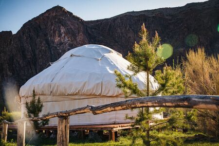 Kazakh yurt on the Silk Way in Kazakhstan green mountainsの写真素材