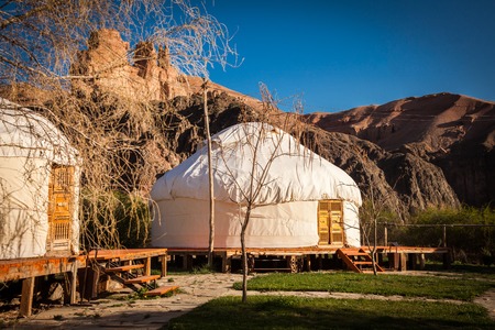 Kazakh yurt on the Silk Way in Kazakhstan green mountainsの写真素材