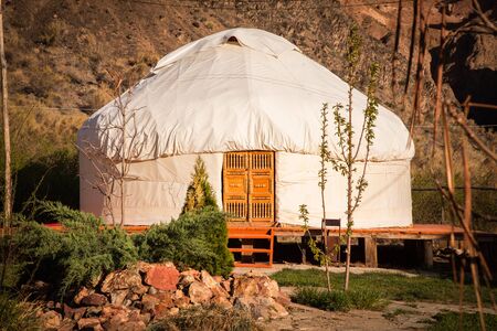 Kazakh yurt on the Silk Way in Kazakhstan green mountainsの写真素材