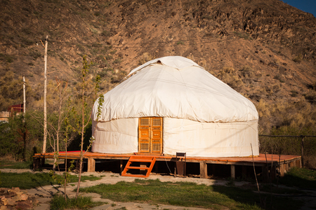 Kazakh yurt on the Silk Way in Kazakhstan green mountainsの写真素材