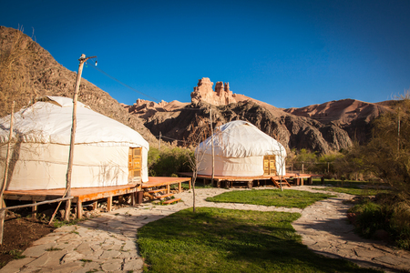 Kazakh yurt on the Silk Way in Kazakhstan green mountainsの写真素材