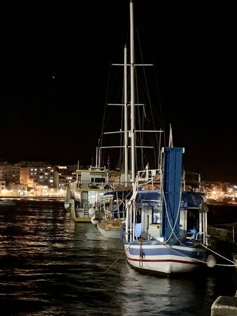 Serenity night time on the Pier of St Paul's Bay, Maltaの写真素材