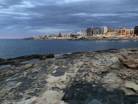 Colorfull Sunset in Saint Pauls Bay, Maltaの写真素材