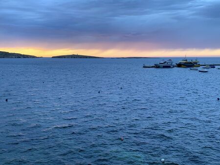 Colorfull Sunset in Saint Pauls Bay, Maltaの写真素材