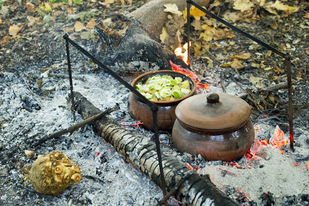 Roast in a clay pot over charcoalの写真素材
