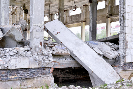 Pieces of Metal and Stone are Crumbling from Demolished Building Floors