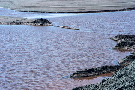 Production waste is accumulated in water.の写真素材