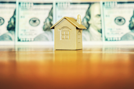 Passport, money and home - the concept of buying a property.の写真素材