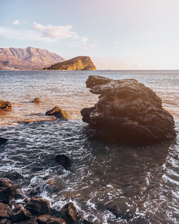 Beautiful seascape with rocks and mountains.