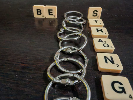 Metal Ring on Wooden Background â€“ Strength and Unity Concept