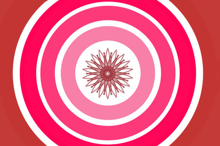 Red flower-like mandala with concentric circles in pink and white radiating from centerの写真素材