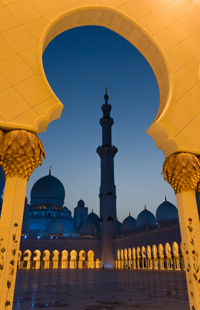 a view from the courtyard with pillars of the Sheikh Zayed Grand Mosque in the UAE capital Abu Dhabiのeditorial素材