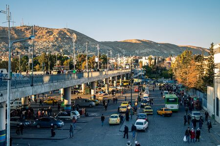 Buss station under Al Jameyah As Soureya bridje in Damascus (Syrian Arab Republic) after war ended in 02.12..2019のeditorial素材
