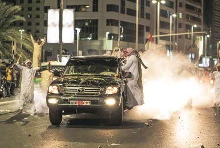 UAE national Day people celebrating in Abu Dhabi Streets in December 2, 2011 in UAE, Abu Dhabiのeditorial素材