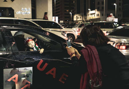 UAE national Day people celebrating in Abu Dhabi Streets in December 2, 2011 in UAE, Abu Dhabiのeditorial素材