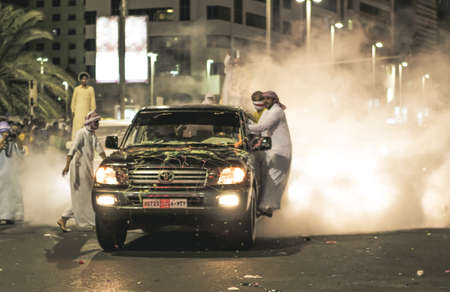 UAE national Day people celebrating in Abu Dhabi Streets in December 2, 2011 in UAE, Abu Dhabiのeditorial素材