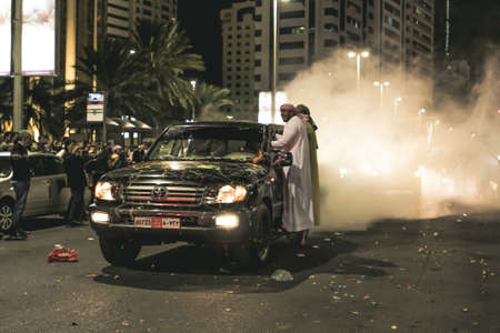 UAE national Day people celebrating in Abu Dhabi Streets in December 2, 2011 in UAE, Abu Dhabiのeditorial素材