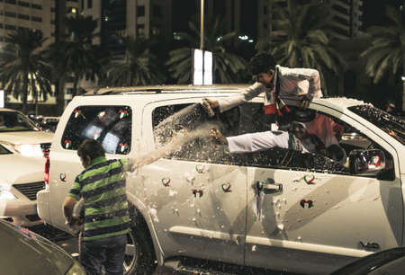 UAE national Day people celebrating in Abu Dhabi Streets in December 2, 2011 in UAE, Abu Dhabiのeditorial素材