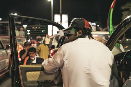 UAE national Day people celebrating in Abu Dhabi Streets in December 2, 2011 in UAE, Abu Dhabiのeditorial素材