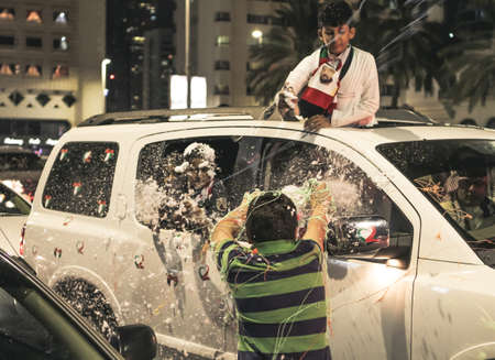 UAE national Day people celebrating in Abu Dhabi Streets in December 2, 2011 in UAE, Abu Dhabiのeditorial素材