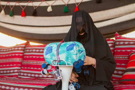 UAE emirati women wear traditional dress in Al Wathba Festival in Western Region Abu Dhabi on December 9 2012のeditorial素材