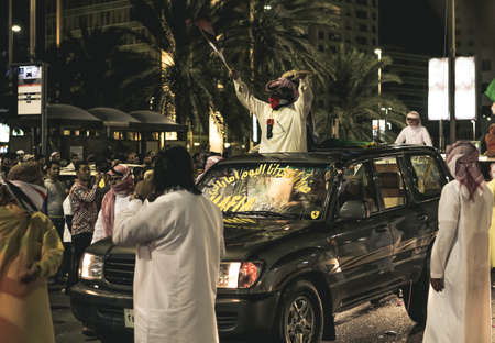 UAE national Day people celebrating in Abu Dhabi Streets in December 2, 2011 in UAE, Abu Dhabiのeditorial素材