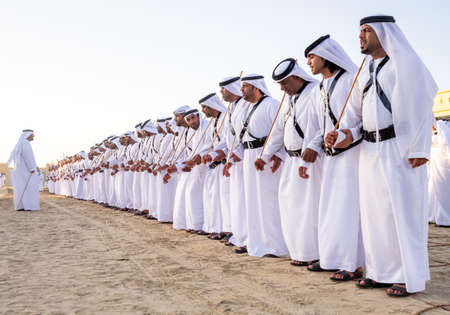 Men perfume yola dance  in SHEIKH ZAYED HERITAGE FESTIVAL september 22, 2014 in Abu Dhab, united arab emiratesのeditorial素材