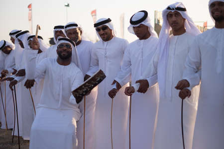 Men  perfume yola dance in western region Abu Dhabi in february 12, 2015のeditorial素材