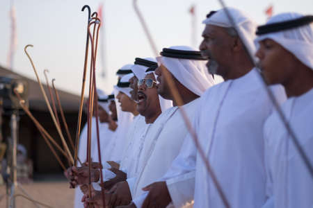 men perfume yola dance in western region Abu Dhabi in february 12, 2015のeditorial素材