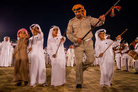 kids and man perfume yola SHEIKH ZAYED HERITAGE FESTIVAL september 22, 2014 in Abu Dhab, united arab emiratesのeditorial素材