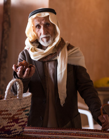 old man present  dates fruit in Al Dhafra Festival in December 26, 2014 , Abu Dhabi United Arab...